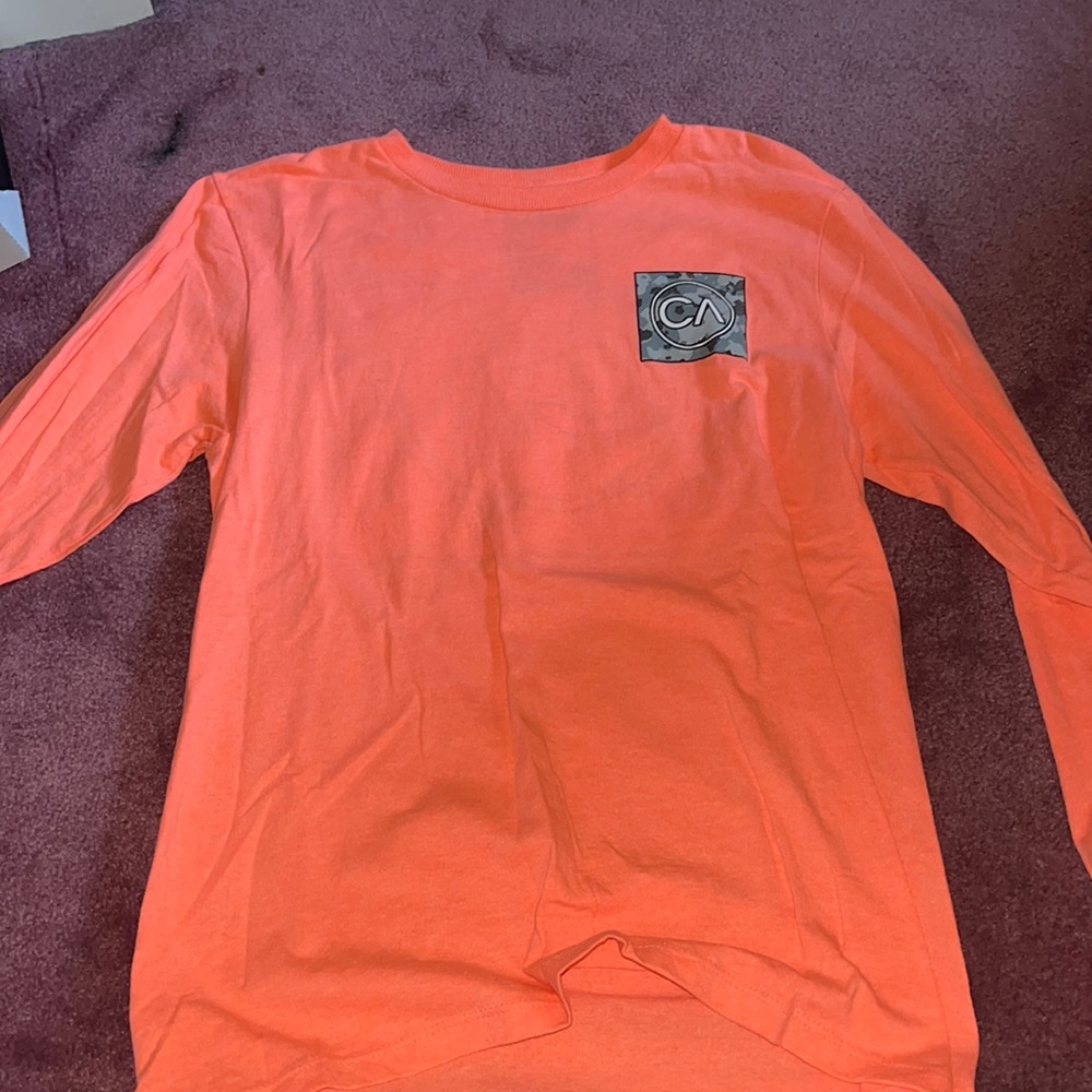 Never worn long sleeve shirt